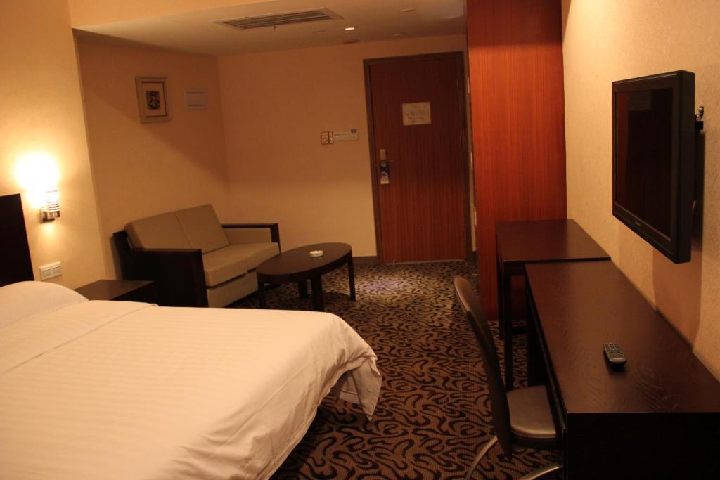Xin Hua Hotel Canton Chambre photo